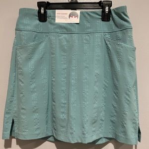 Lady Hagen golf skort sea glass / dusty teal